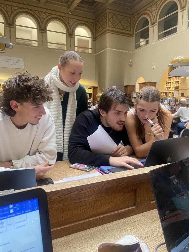 Students working together at a library table
